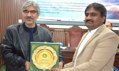 Project Director Shahid Imran Ranjha presenting shield