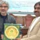 Project Director Shahid Imran Ranjha presenting shield