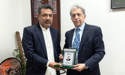 Shield is being presented to Syed Tahir Raza Hamdani on behalf of Daily Sada-e-Sach & National Press Club