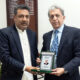 Shield is being presented to Syed Tahir Raza Hamdani on behalf of Daily Sada-e-Sach & National Press Club
